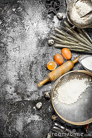 Baking background. Ingredients and tools for dough preparation. Stock Photo