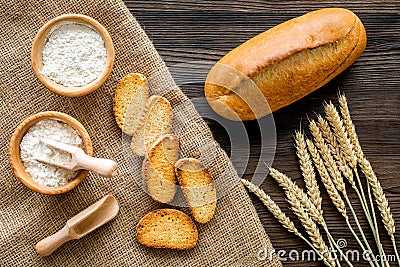 Baking bread with wheat flour and ears on table rystic background top view Stock Photo