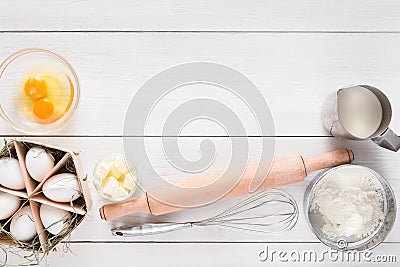 Baking ingredients on white rustic wood background, copy space Stock Photo