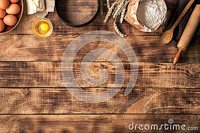 Baking ingredients on a wooden table with copy space Stock Photo
