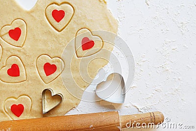 Baking love heart cookies for Valentine day. Top view Stock Photo