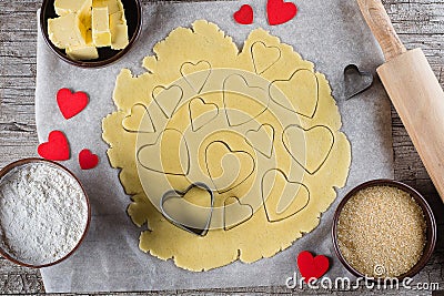 Baking love heart cookies for Valentine day. Top view Stock Photo