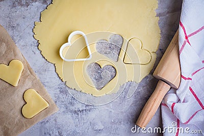 Baking love heart cookies for Valentine day. Top view Stock Photo