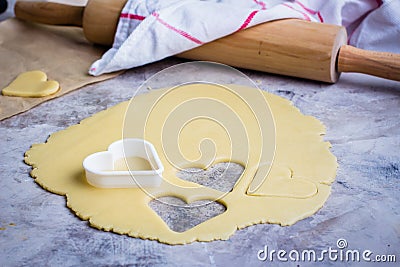 Baking love heart cookies for Valentine day. Top view Stock Photo