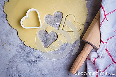 Baking love heart cookies for Valentine day. Top view Stock Photo