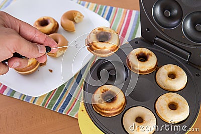 Baking Mini Donuts Stock Photo