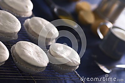 Baking Nevadas, Portuguese Iced Pastries with Ovos Moles Stock Photo