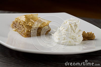 Baklava close up served with greek yogurt Stock Photo