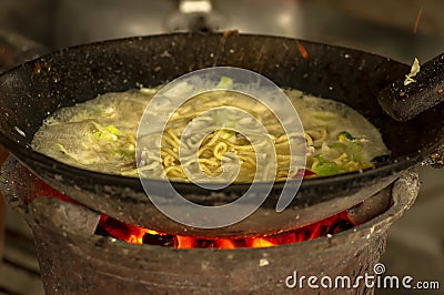 Bakmi Jawa or Bakmi Godhog, Indonesian traditional street food, boiled noodles cooked with spices typical of Javanese cuisine Stock Photo