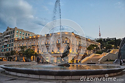 Baku, Azerbaijan - August 8, 2012: Night view Fountain, in the center of which is sculpture of Bahram Gur - one of the characters Editorial Stock Photo