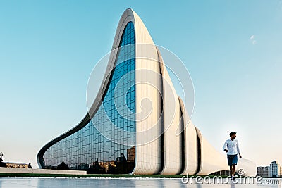 Young people walks near Heydar Aliev Center, Baku, Azerbaijan Editorial Stock Photo