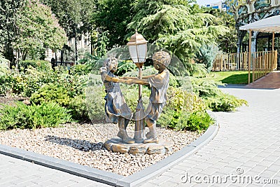 Baku, Azerbaijan - September 26, 2018: Sculpture Children`s roundelay in Park officers Editorial Stock Photo