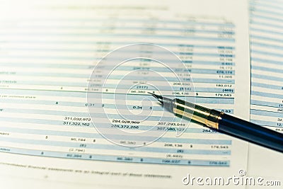 Balance accounting sheet in stockholder report book Stock Photo