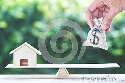 Balance home and money, home loan, reverse mortgage concept. Stock Photo