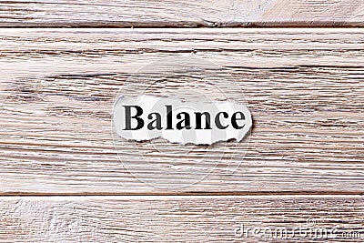 Balance of the word on paper. concept. Words of Balance on a wooden background Stock Photo