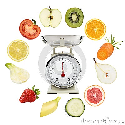 Balanced diet concept. weight scales with fruits and vegetables Stock Photo