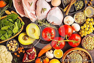 Balanced diet food background. Healthy ingredients on a dark background, top view. Stock Photo