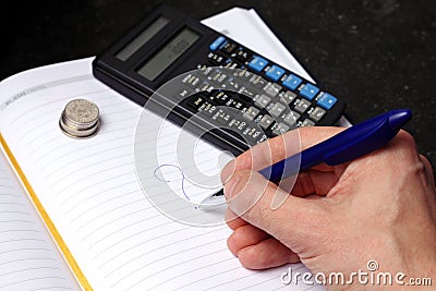 Balancing finances Stock Photo