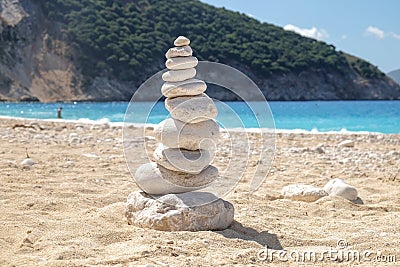 Balancing several of stones on the seashore beach Stock Photo