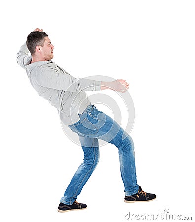 Balancing young man or dodge falling man Stock Photo