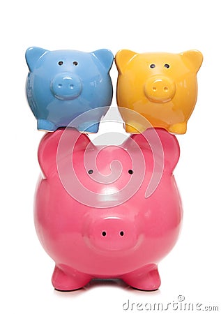 Balancing your finances piggy banks Stock Photo