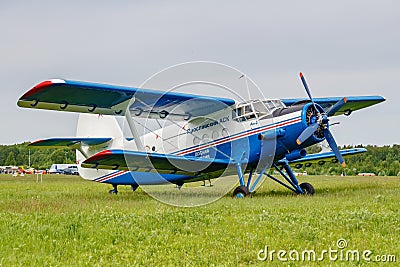 Balashikha, Moscow region, Russia - May 25, 2019: White and blue soviet aircraft biplane Antonov AN-2 at the parking on airfield Editorial Stock Photo