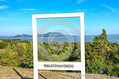BalatongyÃ¶rÃ¶k szÃ©pkilÃ¡tÃ³ nice view view point with badacsony mountain in polaroid frame structure Stock Photo