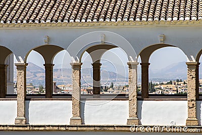 Balcony with arches in a patio de la Acequia La Alhambra, Granada, Spain Stock Photo