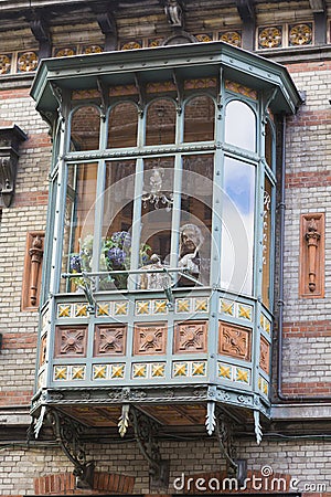 Balcony detail from a handmade sewing cloth shop Editorial Stock Photo