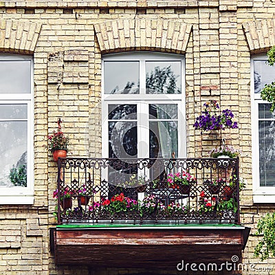 Balcony with flowers at summertime Stock Photo