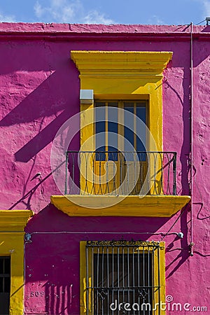 Balcony at old historic building in Oaxaca city with wonderful bright colors Stock Photo