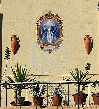 Balcony With Plants And Religious Picture In Faro Portugal Stock Photo