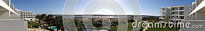 Balcony view on a garden, river and city of Portimao - panorama wide picture Stock Photo