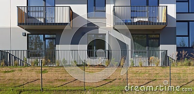 The balcony and windows of the modern mass production home Stock Photo