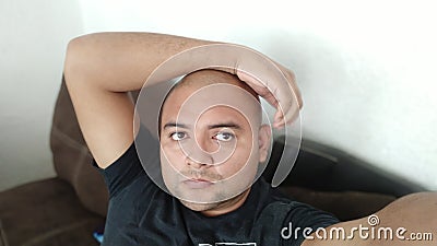 bald man mexican portraying himself Stock Photo