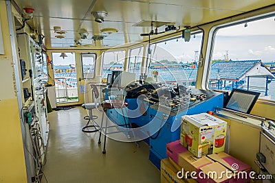 BALI, INDONESIA - APRIL 05, 2017: Ferry boat pilot command cabin with view on the sea Editorial Stock Photo