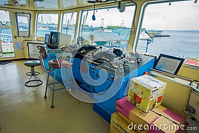 BALI, INDONESIA - APRIL 05, 2017: Ferry boat pilot command cabin with view on the sea Editorial Stock Photo