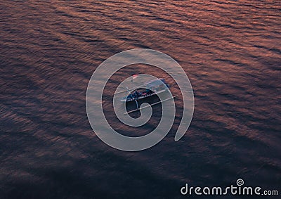 BALI - INDONESIA JANUARY 2018 - Fisherman on small boat Editorial Stock Photo