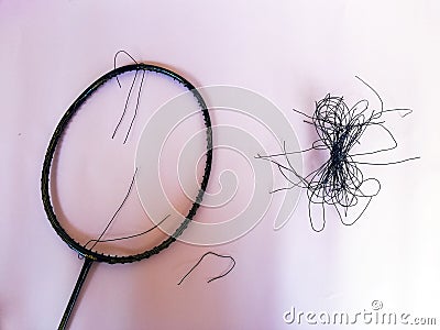 Badminton racket with a broken strings,on color background Editorial Stock Photo