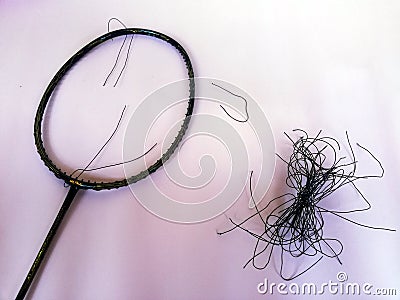 Badminton racket with a broken strings,on color background Editorial Stock Photo