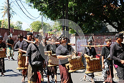 Local balinese people playing traditional music instrument on ceremony. Editorial Stock Photo