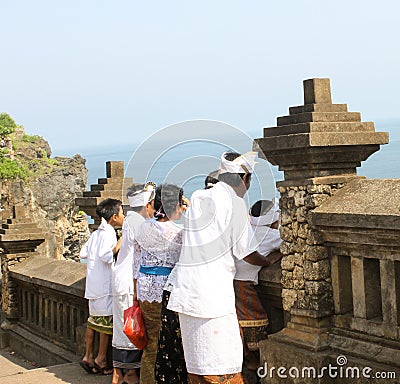 Balinese hindu people dressed in traditional dresses for pray Editorial Stock Photo