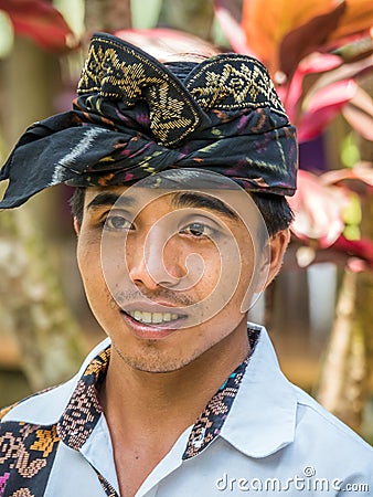 Balinese local working in the Restaurant near Mount Agung Editorial Stock Photo