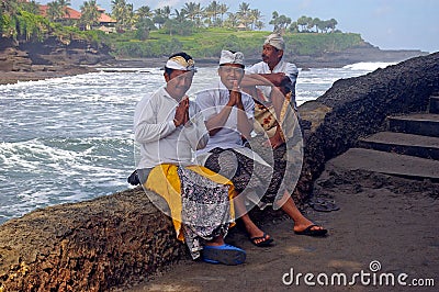 Balinese men by the sea Stock Photo