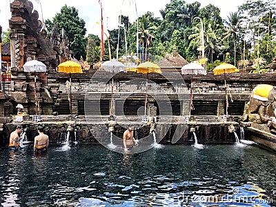 Balinese Purify Themselves By Bathing At Pura Tirta Empul A Hindu Temple Complex Editorial Stock Photo