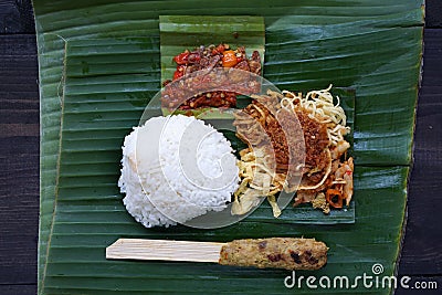 Balinese ready-to-eat street food, packaged in small portions of banana leaves Stock Photo