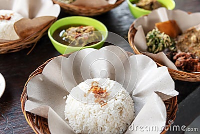 Balinese traditional lunch, rice and other dishes Stock Photo