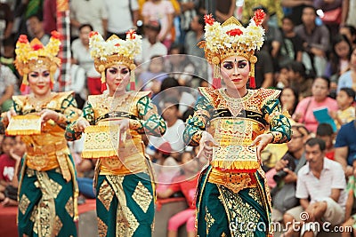 Balinese women dancing traditional temple dance Legong Editorial Stock Photo