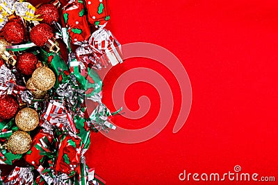 Ball background for Holiday party, new year, Christmas or Birthday Candy and Glitter ball on red background Stock Photo