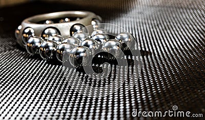 Ball bearings and wheel bearing on carbon fiber cloth 2 Stock Photo